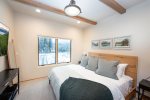 Bedroom 3 is tastefully decorated with a modern-rustic design.
